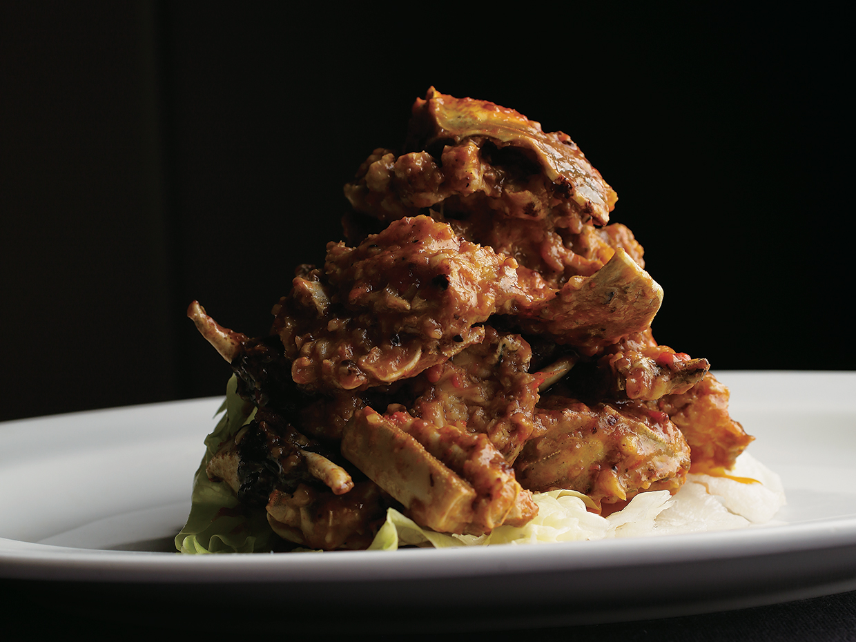 「ミモザ」上海蟹をぶつ切りにし、豆豉風味で炒めた一品